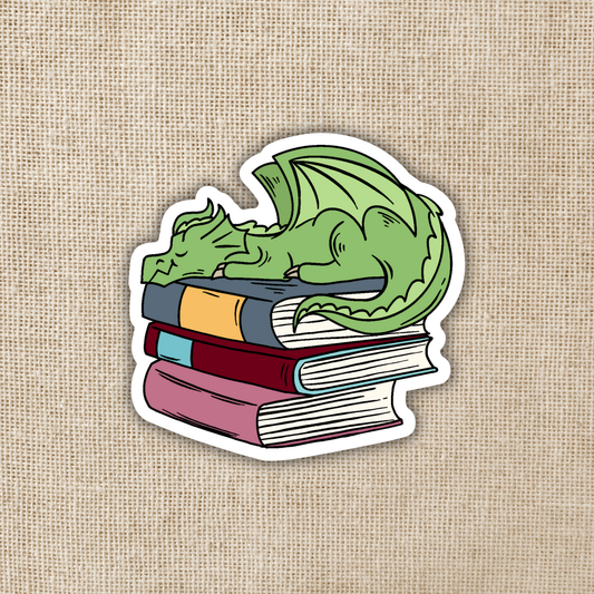 Dragon Sleeping on Book Pile Sticker